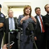 General Motors CEO Mary Barra (C) talks to reporters after testifying before the House Energy and Commerce Committee hearing on Capitol Hill General Motors CEO Mary Barra (C) talks to reporters after testifying before the House Energy and Commerce Committee hearing on Capitol Hill