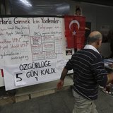 A board shows alternative ways to access Twitter, is placed at an election campaign office of the main opposition Republican's People's Part A board shows alternative ways to access Twitter, is placed at an election campaign office of the main opposition Republican's People's Part