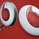 Vodafone branding is seen outside a retail store in London November 12, 2013. REUTERS/Toby Melville Vodafone branding is seen outside a retail store in London November 12, 2013. REUTERS/Toby Melville