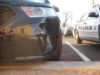 An Oshkosh police car that was damaged during an incident with a driver who was arrested for OWI, April 2, 2014. (Photo from: Oshkosh Police Department) An Oshkosh police car that was damaged during an incident with a driver who was arrested for OWI, April 2, 2014. (Photo from: Oshkosh Police Department)