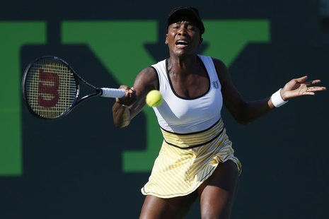 Mar 23, 2014; Miami, FL, USA; Venus Williams hits a forehand against Casey Dellacqua (not pictured) on day seven of the Sony Open at Crandon Mar 23, 2014; Miami, FL, USA; Venus Williams hits a forehand against Casey Dellacqua (not pictured) on day seven of the Sony Open at Crandon