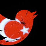 A Turkish national flag is seen through a broken Twitter logo in this photo illustration taken in Zenica, March 21, 2014. REUTERS/Dado Ruvic A Turkish national flag is seen through a broken Twitter logo in this photo illustration taken in Zenica, March 21, 2014. REUTERS/Dado Ruvic