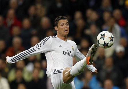 Real Madrid's Cristiano Ronaldo controls the ball during their Champions League quarter-final first leg soccer match against Borussia Dortmu Real Madrid's Cristiano Ronaldo controls the ball during their Champions League quarter-final first leg soccer match against Borussia Dortmu