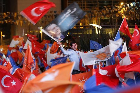 Supporters of Turkey's Prime Minister Tayyip Erdogan celebrate their election victory in front of the party headquarters in Ankara March 31, Supporters of Turkey's Prime Minister Tayyip Erdogan celebrate their election victory in front of the party headquarters in Ankara March 31,