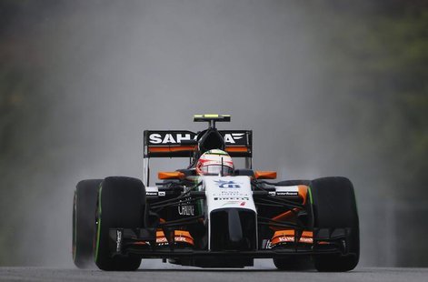 Force India Formula One driver Sergio Perez of Mexico drives during the qualifying session for the Malaysian F1 Grand Prix at Sepang Interna Force India Formula One driver Sergio Perez of Mexico drives during the qualifying session for the Malaysian F1 Grand Prix at Sepang Interna