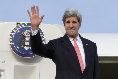 U.S. Secretary of State John Kerry waves goodbye as he leaves Brussels, to fly to Algeria, April 2, 2014. REUTERS/Jacquelyn Martin/Pool U.S. Secretary of State John Kerry waves goodbye as he leaves Brussels, to fly to Algeria, April 2, 2014. REUTERS/Jacquelyn Martin/Pool