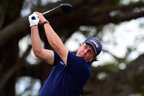Mar 9, 2014; Miami, FL, USA; Phil Mickelson tees off from the 5th hole during the final round of the WGC - Cadillac Championship golf tourna Mar 9, 2014; Miami, FL, USA; Phil Mickelson tees off from the 5th hole during the final round of the WGC - Cadillac Championship golf tourna