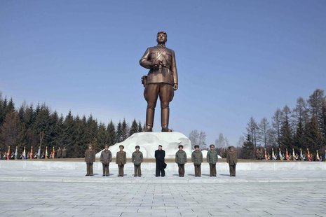North Korean leader Kim Jong Un (C) stands with commanding officers of the combined units of the Korean People's Army (KPA) in this undated North Korean leader Kim Jong Un (C) stands with commanding officers of the combined units of the Korean People's Army (KPA) in this undated