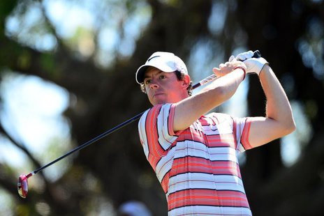Mar 8, 2014; Miami, FL, USA; ?Rory McIlroy tees off from the 5th hole during the third round of the WGC - Cadillac Championship golf tournam Mar 8, 2014; Miami, FL, USA; ?Rory McIlroy tees off from the 5th hole during the third round of the WGC - Cadillac Championship golf tournam