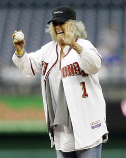 Food Network personality Paula Deen laughs before throwing out the first pitch prior to the Washington Nationals versus New York Mets MLB ba Food Network personality Paula Deen laughs before throwing out the first pitch prior to the Washington Nationals versus New York Mets MLB ba