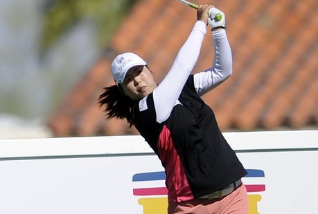 Apr 3, 2014; Rancho Mirage, CA, USA; Shanshan Feng on the ninth hole in the first round of the Kraft Nabisco Championship golf tournament at Apr 3, 2014; Rancho Mirage, CA, USA; Shanshan Feng on the ninth hole in the first round of the Kraft Nabisco Championship golf tournament at