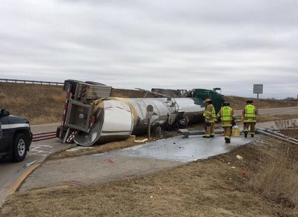 Firefighters work on an overturned milk truck in Fond du Lac, April 3, 2014. (Photo from: Fond du Lac Fire Department) Firefighters work on an overturned milk truck in Fond du Lac, April 3, 2014. (Photo from: Fond du Lac Fire Department)