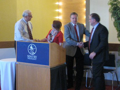 Sentry Foundation press conference announcing 3.7 million dollar school technology funding. Todd Kuckkahn, Angel Faxon, Attila Wedinger, Jim Weishan Sentry Foundation press conference announcing 3.7 million dollar school technology funding. Todd Kuckkahn, Angel Faxon, Attila Wedinger, Jim Weishan