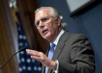 Richard Fisher, president and CEO of the Federal Reserve Bank of Dallas, gestures as he speaks during a conference before the Committee for Richard Fisher, president and CEO of the Federal Reserve Bank of Dallas, gestures as he speaks during a conference before the Committee for