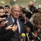 Senator Dan Coats (R-IN) talks to the media after former CIA Director David Petraeus testified at a Senate Intelligence Committee closed hea Senator Dan Coats (R-IN) talks to the media after former CIA Director David Petraeus testified at a Senate Intelligence Committee closed hea