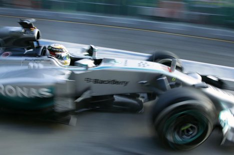 Mercedes Formula One driver Lewis Hamilton of Britain drives out of the pits during the second practice session of the Australian F1 Grand P Mercedes Formula One driver Lewis Hamilton of Britain drives out of the pits during the second practice session of the Australian F1 Grand P