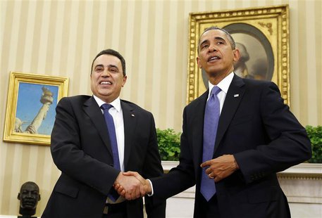 U.S. President Barack Obama and Tunisia's Prime Minister Mehdi Jomaa shake hands in the Oval Office of the White House in Washington, April U.S. President Barack Obama and Tunisia's Prime Minister Mehdi Jomaa shake hands in the Oval Office of the White House in Washington, April