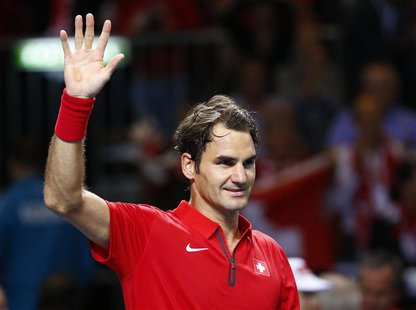Roger Federer of Switzerland reacts during his Davis Cup quarter-final tennis match against Mikhail Kukushkin of Kazakhstan in Geneva April Roger Federer of Switzerland reacts during his Davis Cup quarter-final tennis match against Mikhail Kukushkin of Kazakhstan in Geneva April