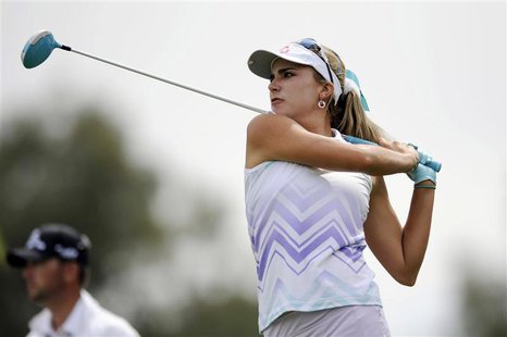 Apr 4, 2014; Rancho Mirage, CA, USA; Lexi Thompson tees off on the seventh hole in the second round of the Kraft Nabisco Championship golf t Apr 4, 2014; Rancho Mirage, CA, USA; Lexi Thompson tees off on the seventh hole in the second round of the Kraft Nabisco Championship golf t