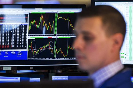 A trader works on the floor of the New York Stock Exchange shortly after the opening bell in New York April 4, 2014. REUTERS/Lucas Jackson A trader works on the floor of the New York Stock Exchange shortly after the opening bell in New York April 4, 2014. REUTERS/Lucas Jackson