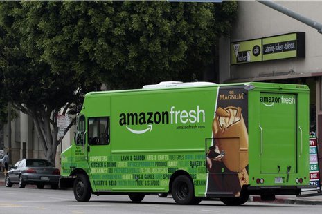 An Amazon Fresh delivery van moves down Pico Bloulevard in Los Angeles, California, June 14, 2013. REUTERS/Jonathan Alcorn An Amazon Fresh delivery van moves down Pico Bloulevard in Los Angeles, California, June 14, 2013. REUTERS/Jonathan Alcorn