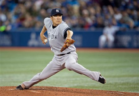 Apr 4, 2014; Toronto, Ontario, CAN; New York Yankees starting pitcher Masahiro Tanaka (19) throws a pitch during the fourth inning in a game Apr 4, 2014; Toronto, Ontario, CAN; New York Yankees starting pitcher Masahiro Tanaka (19) throws a pitch during the fourth inning in a game
