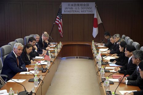 U.S. Secretary of Defense Chuck Hagel (L) speaks as Japan's Defense Minister Itsunori Onodera (3rd R) listens during their meeting at the de U.S. Secretary of Defense Chuck Hagel (L) speaks as Japan's Defense Minister Itsunori Onodera (3rd R) listens during their meeting at the de