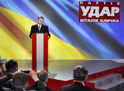 Ukrainian politician Petro Poroshenko addresses members of an UDAR (Punch) party during a meeting in Kiev March 29, 2014. REUTERS/Viktor Gur Ukrainian politician Petro Poroshenko addresses members of an UDAR (Punch) party during a meeting in Kiev March 29, 2014. REUTERS/Viktor Gur