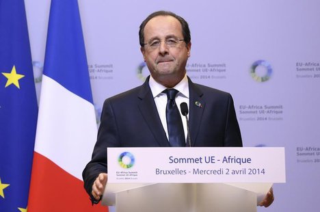 France's President Francois Hollande speaks at a joint news conference with Germany's Chancellor Angela Merkel (not pictured) during a Europ France's President Francois Hollande speaks at a joint news conference with Germany's Chancellor Angela Merkel (not pictured) during a Europ