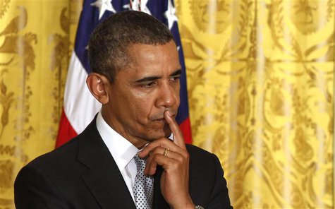 U.S. President Barack Obama pauses before talking about the Fort Hood shooting in Texas, while he hosts a ceremony welcoming the United Stat U.S. President Barack Obama pauses before talking about the Fort Hood shooting in Texas, while he hosts a ceremony welcoming the United Stat