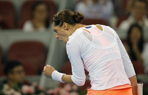 Andrea Petkovic of Germany reacts after scoring a point against Victoria Azarenka of Belarus at the China Open tennis tournament in Beijing Andrea Petkovic of Germany reacts after scoring a point against Victoria Azarenka of Belarus at the China Open tennis tournament in Beijing
