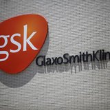 The logo of GlaxoSmithKline (GSK) is seen on its office building in Shanghai July 12, 2013. REUTERS/Aly Song The logo of GlaxoSmithKline (GSK) is seen on its office building in Shanghai July 12, 2013. REUTERS/Aly Song