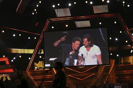 Brian Kelley (L) and Tyler Hubbard of Florida Georgia Line accept the Vocal Duo of the Year Award at the 49th Annual Academy of Country Musi Brian Kelley (L) and Tyler Hubbard of Florida Georgia Line accept the Vocal Duo of the Year Award at the 49th Annual Academy of Country Musi