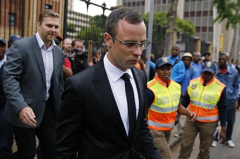 Oscar Pistorius leaves court after his trial for the murder of his girlfriend, Reeva Steenkamp, was postponed at the North Gauteng High Cour Oscar Pistorius leaves court after his trial for the murder of his girlfriend, Reeva Steenkamp, was postponed at the North Gauteng High Cour