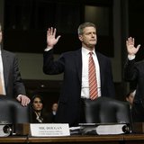 (L-R) Credit Suisse officials CEO Brady Dougan, Robert Shafir and Hans Urlich-Mesiter are sworn in before the Senate Homeland and Government (L-R) Credit Suisse officials CEO Brady Dougan, Robert Shafir and Hans Urlich-Mesiter are sworn in before the Senate Homeland and Government