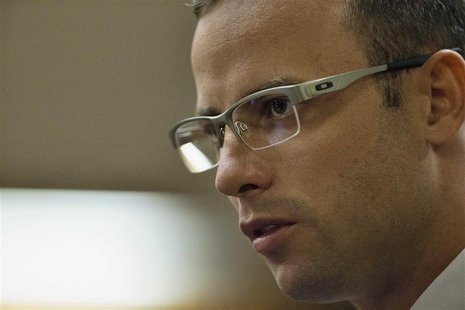 Oscar Pistorius looks on during his trial at the high court in Pretoria April 7, 2014. REUTERS/Themba Hadebe/Pool Oscar Pistorius looks on during his trial at the high court in Pretoria April 7, 2014. REUTERS/Themba Hadebe/Pool