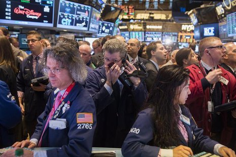 Traders work on the floor of the New York Stock Exchange shortly after the opening bell in New York April 4, 2014. REUTERS/Lucas Jackson Traders work on the floor of the New York Stock Exchange shortly after the opening bell in New York April 4, 2014. REUTERS/Lucas Jackson