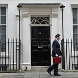 Britain's Chancellor of the Exchequer, George Osborne, walks away from number 11 Downing Street, before delivering his budget to the House o Britain's Chancellor of the Exchequer, George Osborne, walks away from number 11 Downing Street, before delivering his budget to the House o