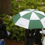 Patrons leave after play was suspended and the course closed due to inclement weather during a practice round ahead of the Masters golf tour Patrons leave after play was suspended and the course closed due to inclement weather during a practice round ahead of the Masters golf tour