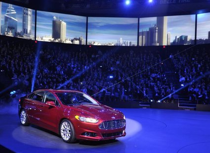 The 2013 Ford Fusion is unveiled on the first press preview day for the North American International Auto Show in Detroit, Michigan, January The 2013 Ford Fusion is unveiled on the first press preview day for the North American International Auto Show in Detroit, Michigan, January