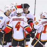 Apr 7, 2014; Newark, NJ, USA; The Calgary Flames celebrate a goal by defenseman Mark Giordano (5) during the third period against the New Je Apr 7, 2014; Newark, NJ, USA; The Calgary Flames celebrate a goal by defenseman Mark Giordano (5) during the third period against the New Je