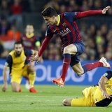 Atletico Madrid's Diego Costa (R) and Barcelona's Marc Bartra fight for the ball during their Champions League quarter-final first leg socce Atletico Madrid's Diego Costa (R) and Barcelona's Marc Bartra fight for the ball during their Champions League quarter-final first leg socce