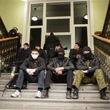 Pro-Russian protesters sit inside the seized regional administrative building in Kharkiv April 6, 2014. REUTERS/Stringer Pro-Russian protesters sit inside the seized regional administrative building in Kharkiv April 6, 2014. REUTERS/Stringer