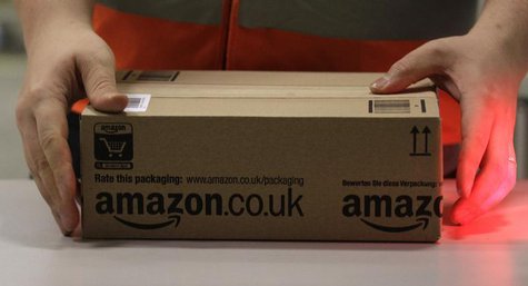 A worker handles items for delivery at Amazon's new distribution center in Brieselang, near Berlin November 28, 2013. REUTERS/Tobias Schwarz A worker handles items for delivery at Amazon's new distribution center in Brieselang, near Berlin November 28, 2013. REUTERS/Tobias Schwarz