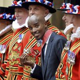 Britain's double Olympic champion Mo Farah poses with his Commander of the Order of the British Empire (CBE) medal, after being presented wi Britain's double Olympic champion Mo Farah poses with his Commander of the Order of the British Empire (CBE) medal, after being presented wi