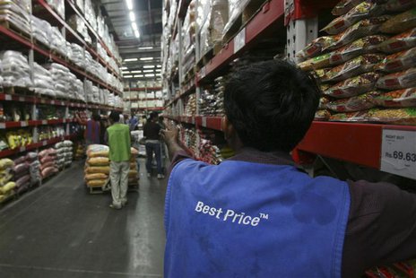 A employee works inside a Best Price Modern Wholesale store, a joint venture of Wal-Mart Stores Inc and Bharti Enterprises, at Zirakpur in t A employee works inside a Best Price Modern Wholesale store, a joint venture of Wal-Mart Stores Inc and Bharti Enterprises, at Zirakpur in t
