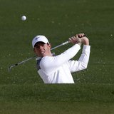 Northern Ireland's Rory McIlroy hits from the sand onto the second green during a practice round ahead of the Masters golf tournament at the Northern Ireland's Rory McIlroy hits from the sand onto the second green during a practice round ahead of the Masters golf tournament at the