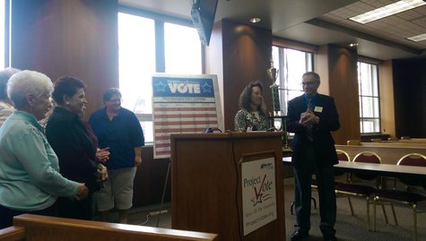 The village of Denmark wins Project VOTE's Voter Challenge trophy on April 8, 2014 at Green Bay City Hall. (Photo from: WTAQ Reporter Jeff Flynt). The village of Denmark wins Project VOTE's Voter Challenge trophy on April 8, 2014 at Green Bay City Hall. (Photo from: WTAQ Reporter Jeff Flynt).