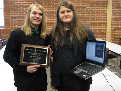 Isaac Vraspir, left, and Luke Juusola, juniors at Watertown-Mayer High School in Watertown, Minn., pose after winning the Program Design Competition at South Dakota State University April 3, 2014. The team topped 12 other entries in the 10th annual computer program contest. Isaac Vraspir, left, and Luke Juusola, juniors at Watertown-Mayer High School in Watertown, Minn., pose after winning the Program Design Competition at South Dakota State University April 3, 2014. The team topped 12 other entries in the 10th annual computer program contest.