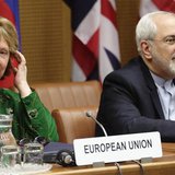 European Union foreign policy chief Catherine Ashton (L) and Iranian Foreign Minister Mohammad Javad Zarif smile at the start of talks in Vi European Union foreign policy chief Catherine Ashton (L) and Iranian Foreign Minister Mohammad Javad Zarif smile at the start of talks in Vi